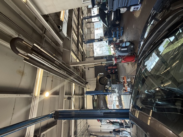 North End Automotive workshop with a vehicle on a lift