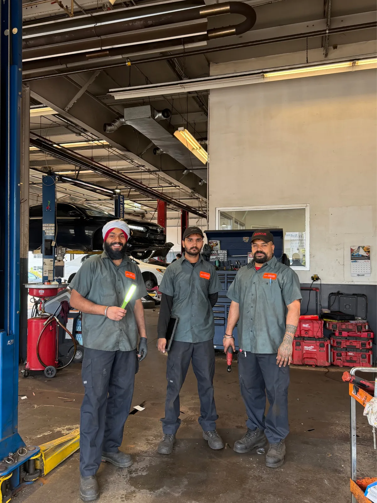 The North End Automotive team inside the shop